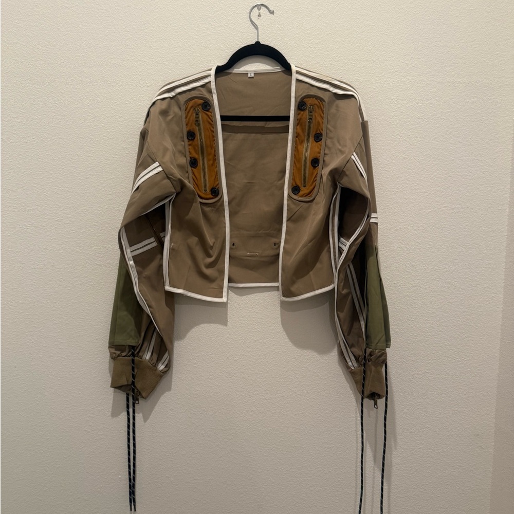 Stylish Tan Jacket with Unique Accents